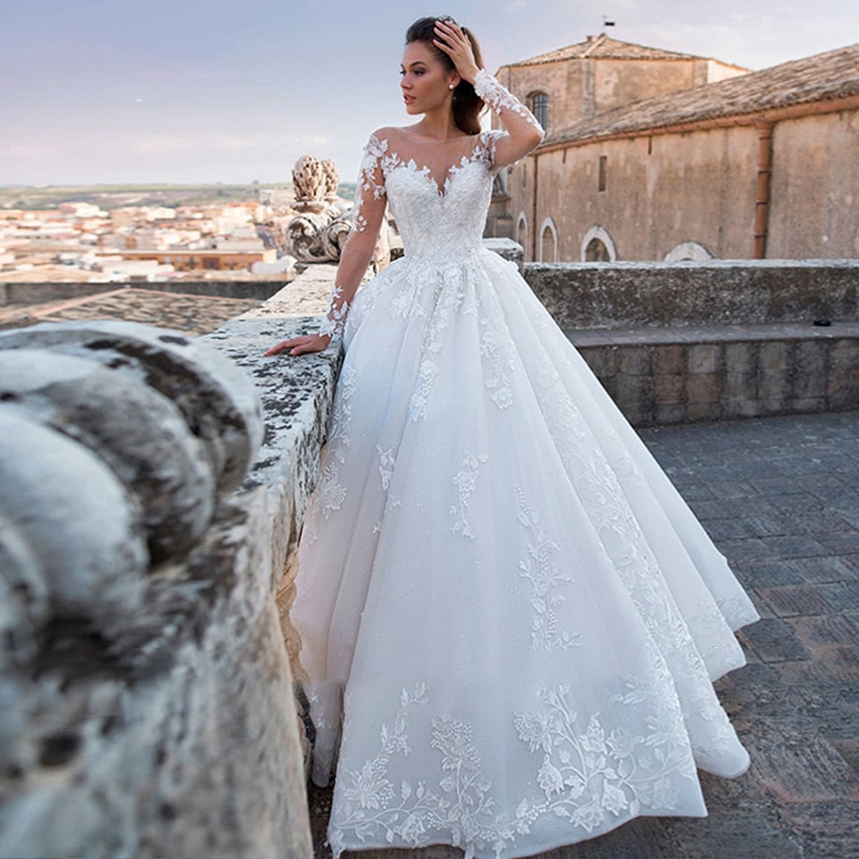 White/Ivory Elegant Wedding Dresses Illusion Long Sleeves Appliques Lace Bride Dresses Princess Tulle Backless Wedding Gown