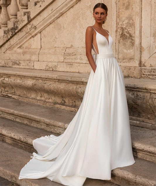 Elegant Long Satin V-Neck Wedding Dresses With Pockets A-Line Ivory Spaghetti Straps Sweep Train Bridal Gowns With Bow